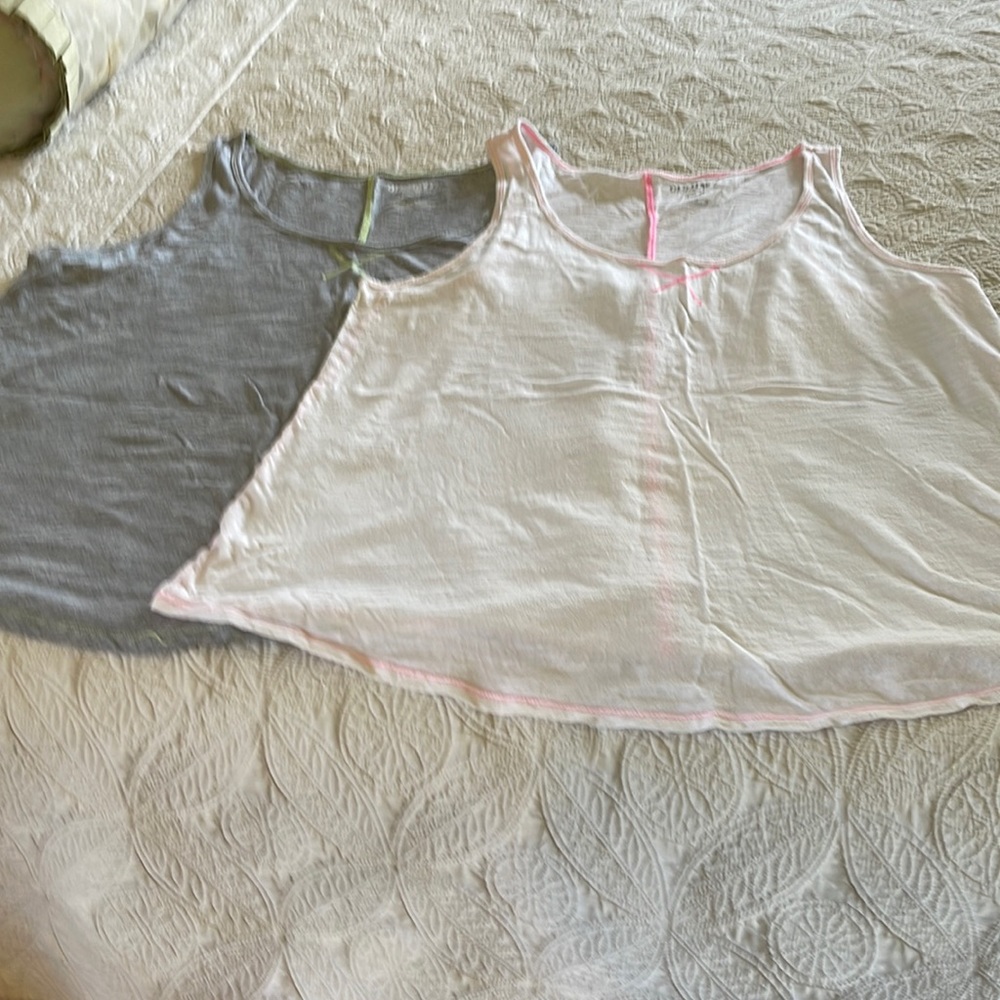 2 For one Old Navy XL tank tops.